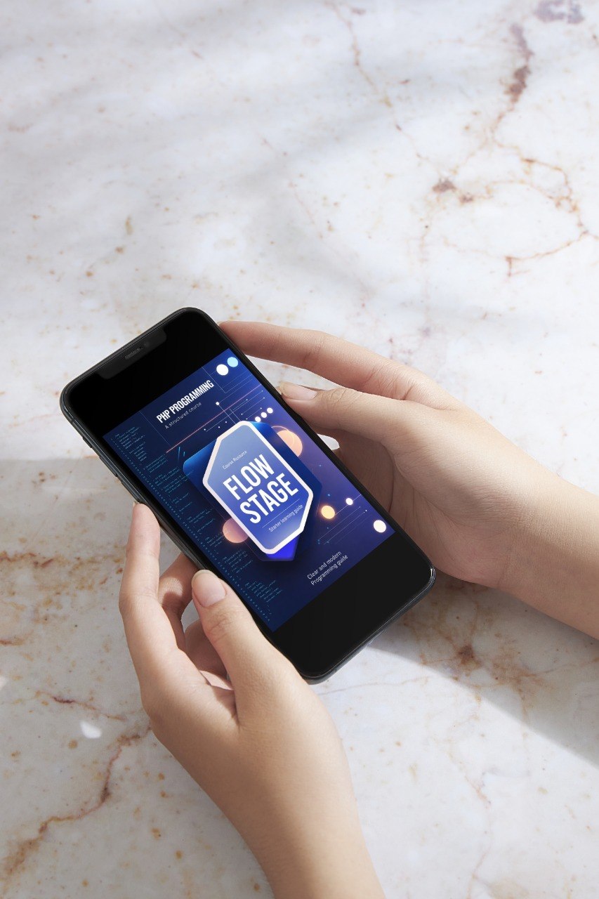 Person holding a smartphone with a 'Flow Stage' app on a marble surface
